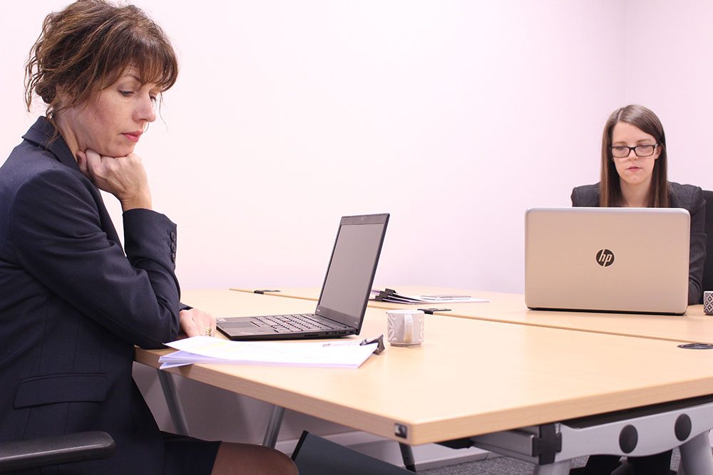 Woman working inside a self storage office