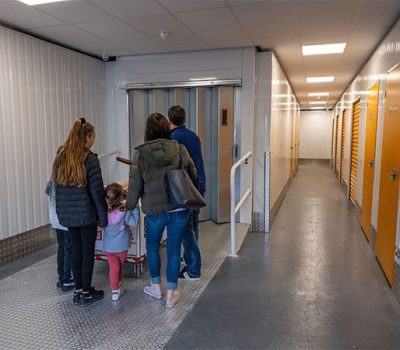 Family going in the storage unit - Self Storage units in Warrington area